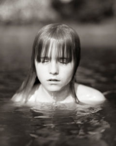swimming girl head out of water 
